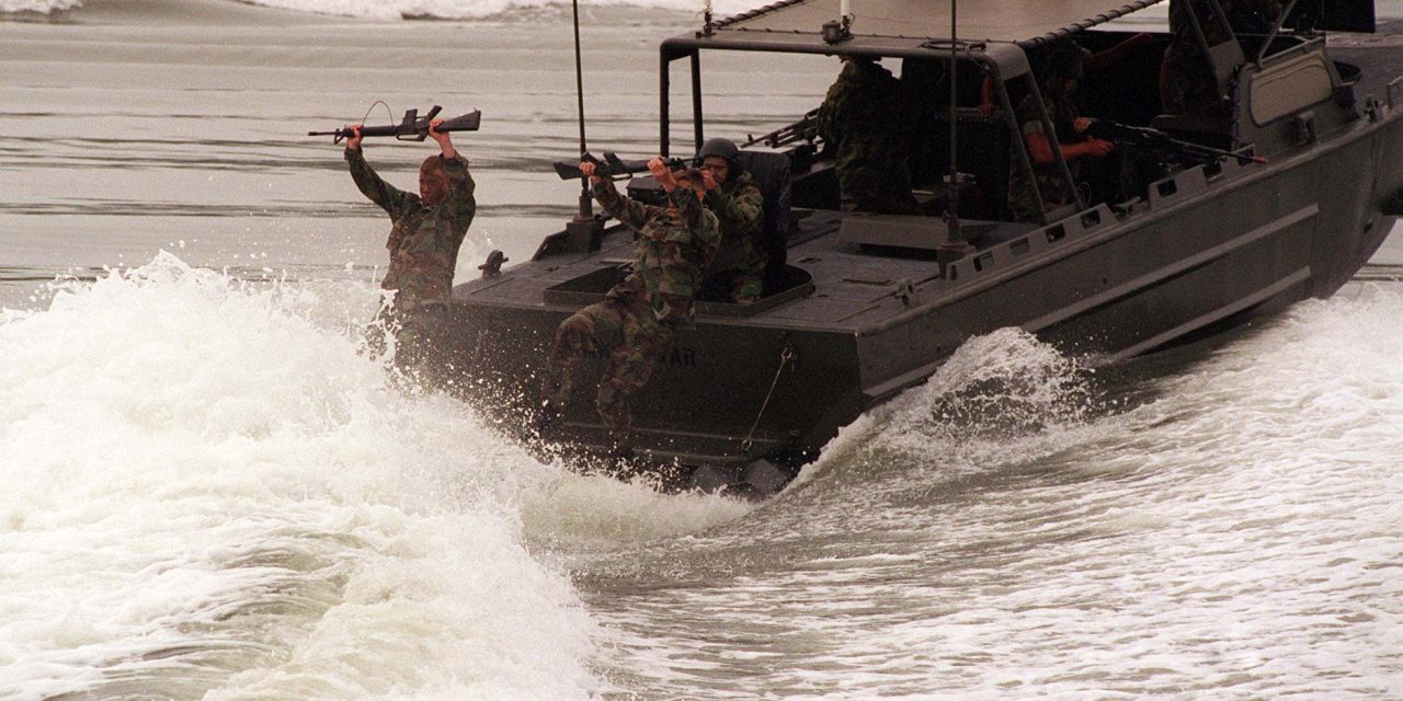 960508-M-7232C-002
U.S. Marines from the 2nd Reconnaissance Company cast off of a Riverine Assault Craft during a Revised Capabilities Exercise at Camp Lejeune, N.C., on May 8, 1996. The Recon Marines and the assault craft are part of the 2nd Marine Division. DoD photo by Lance Cpl. C.D. Clark, U.S. Marine Corps.